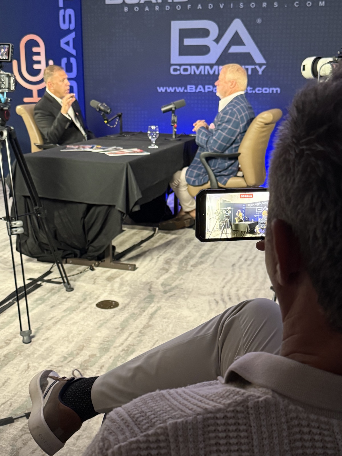 Eric Zwigart in conversation on a podcast set