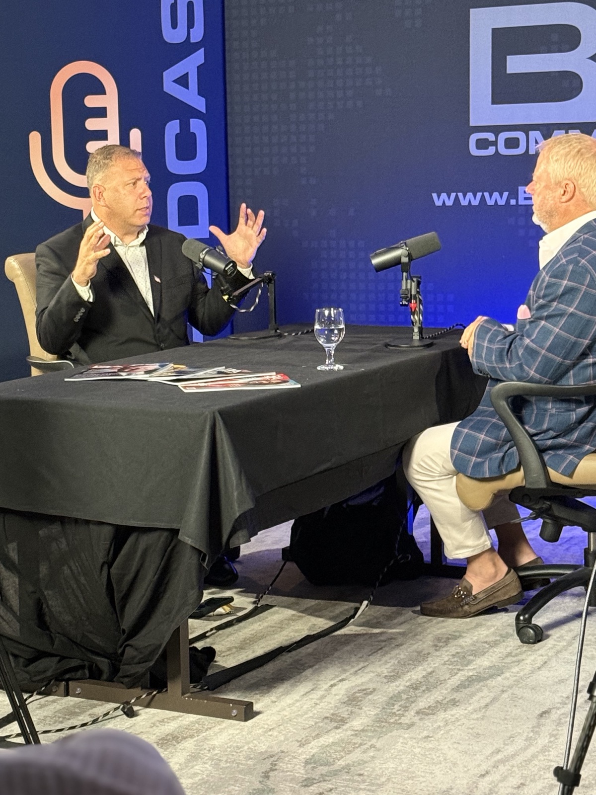Eric Zwigart explaining a point on a podcast set